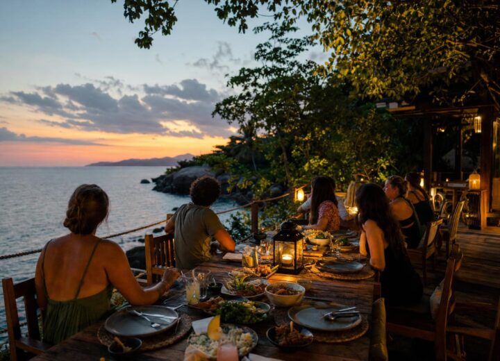 Dinner on a terrace overlooking the sea in Koh Samui at dusk.
